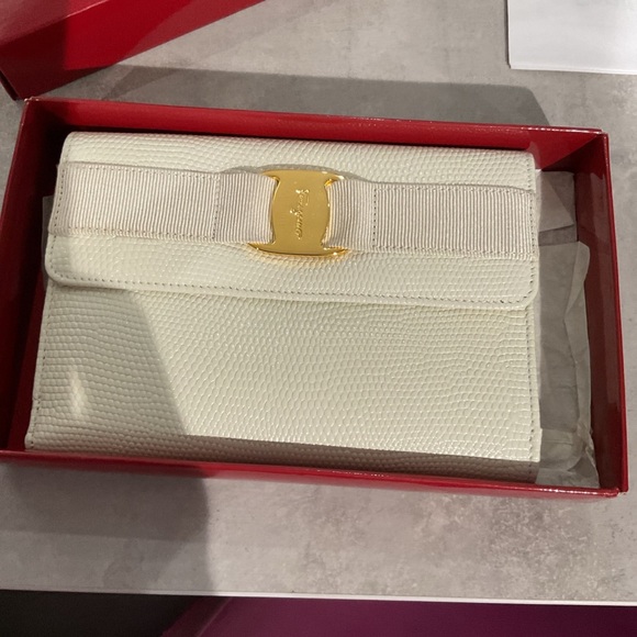 Salvatore Ferragamo Cream Clutch with Gold Buckle